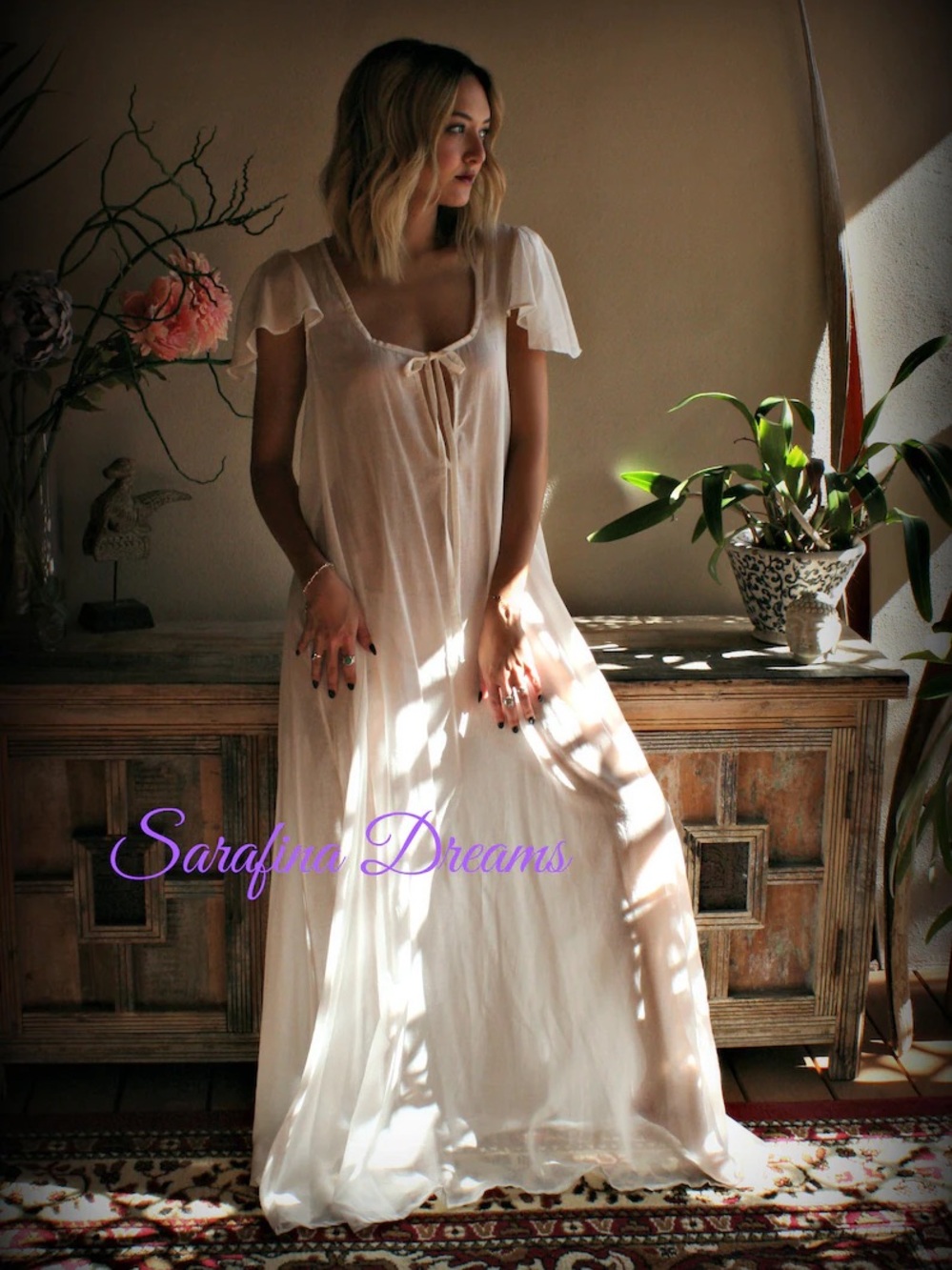 Cotton flutter sleeve sheer nightgown.